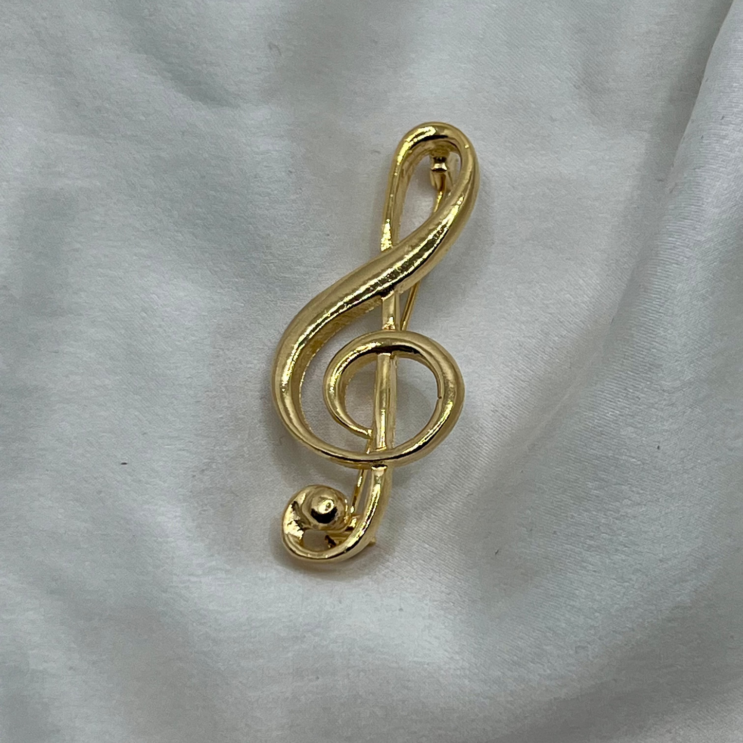 ヴィンテージ・ト音記号ブローチ